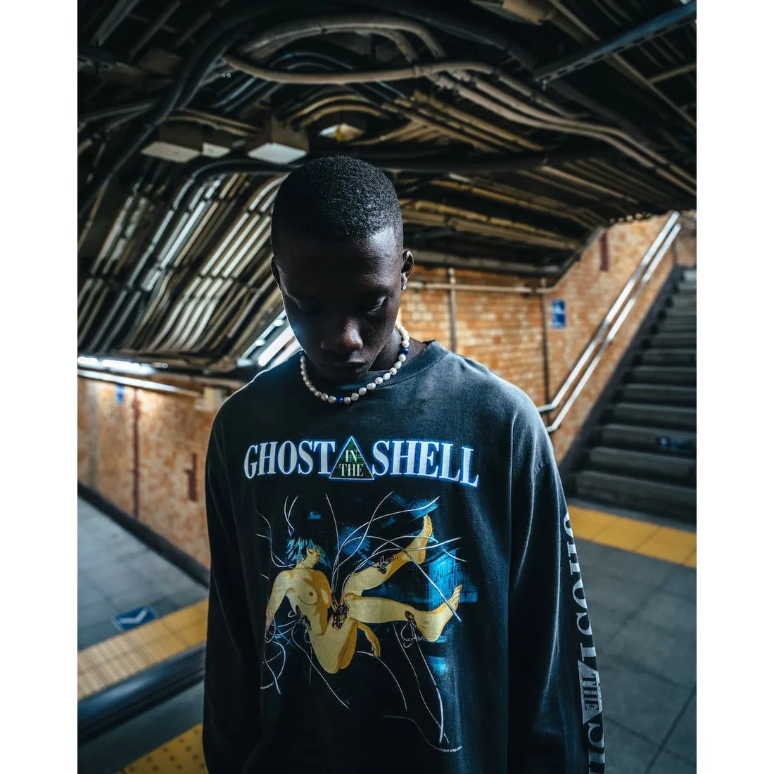 SAINT Mxxxxxx × GHOST IN THE SHELL Ghost in the Shell GS_LS TEE/GITS/BLK Big IP Ghost in the Shell co-branded model Sleeping Motoko Kusanagi Retro distressed long sleeves Washed black S-XL Ready-to-wear Assute dyeing Full-body spray fade/replacement fade Correct accessories Joint LOGO wash mark/main mark/cherub mark Super complex printing replica The drawing/pattern making cycle is very long and the hand graffiti is dirty.